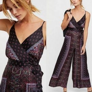 Free People | Silky Boho Cabbage Rose Jumpsuit in Black